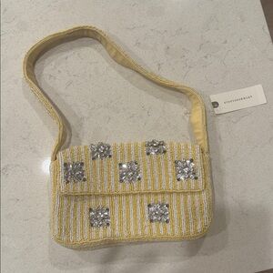 Anthropology The Fiona Beaded Bag yellow 
Tags still on 
Never worn